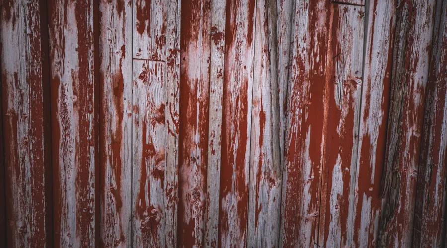 Option B: Semi-Transparent Stain-Sealers - Close-up of weathered red and white wooden planks