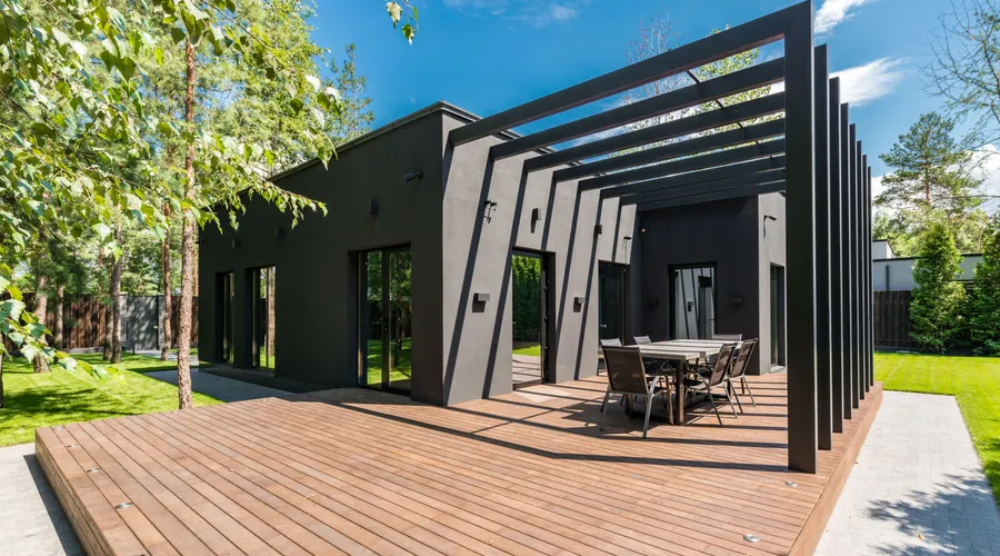 Which Semi-Transparent Stain Should You Choose? - Stylish outdoor space with wooden deck and dining set