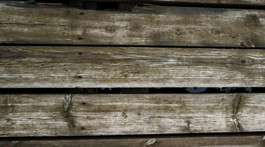 Semi-Transparent Stains - Close-up of rustic wooden planks with a natural texture