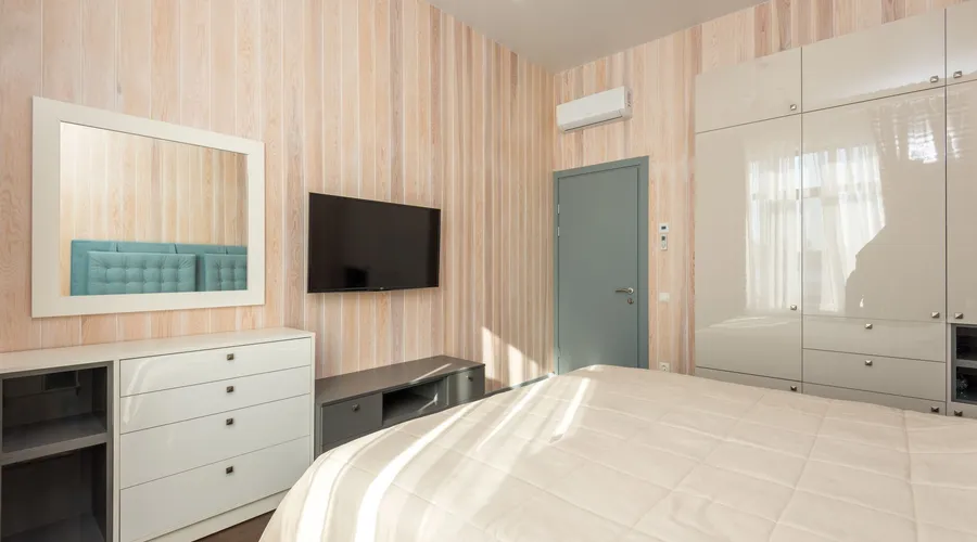 How to Choose the Right Color for Your Furniture - Bright and airy master bedroom featuring minimalist design with contemporary furniture