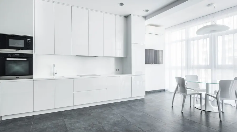Which Paint Type Pairs Best with Each Color? - Sleek white kitchen with modern appliances and minimalist design