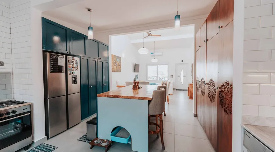 What Is Inkwell (SW 6992)? - Spacious and stylish kitchen featuring a central island and modern design elements
